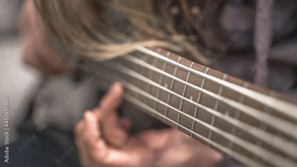 Fototapeta premium musician playing guitar, close up