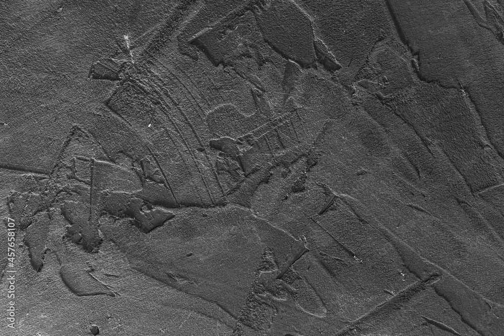 Dark cement background for a grunge-style design. A concrete wall. Grey plaster.