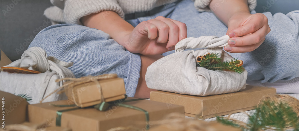 Christmas gift zero waste, eco friendly hand made box packaging gifts in kraft paper wooden table, eco christmas holiday concept, Christmas gift wrapping,eco decor banner