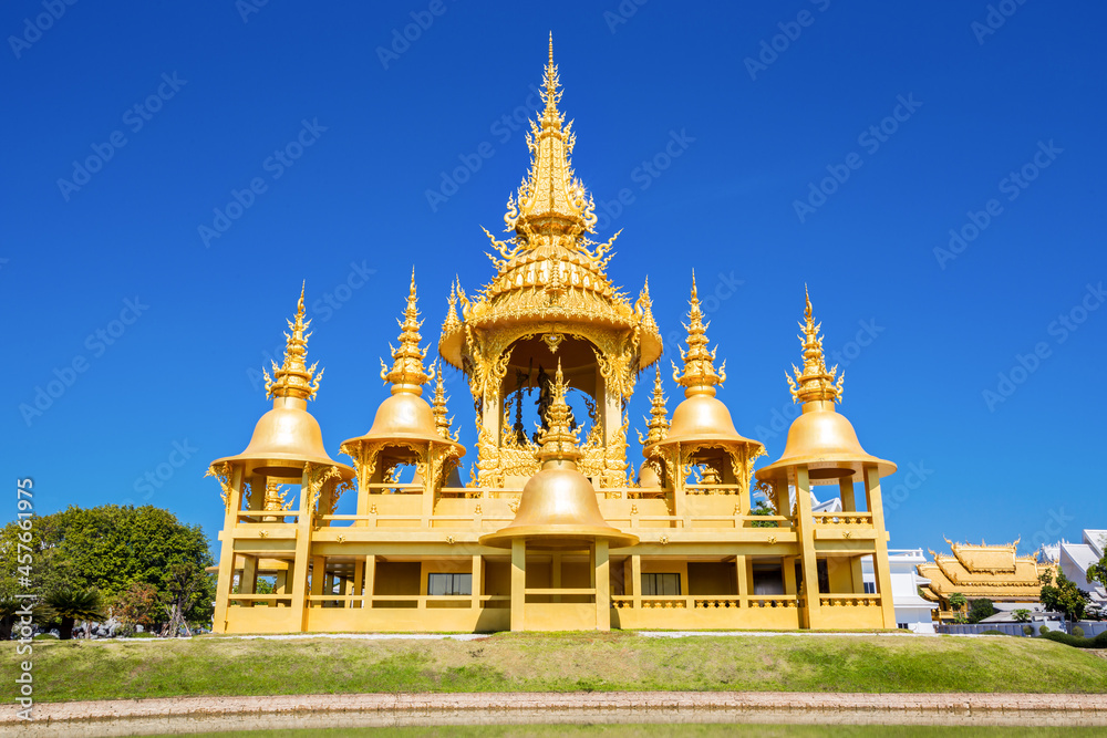 Gold pagoda in Wat Rong Khun or White Temple, Landmark, Thailand.