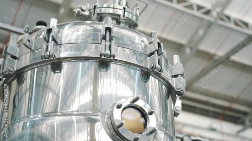 Industrial scale incubator close up tilt down