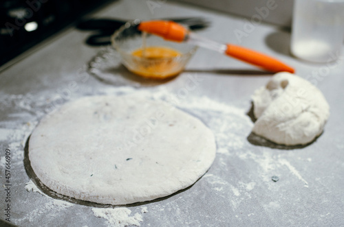 The process of making an Ossetian pie. Ossetian pie. Pie with cheese. National dish. National oriental dish. Caucasian cuisine. Asian cuisine. photo