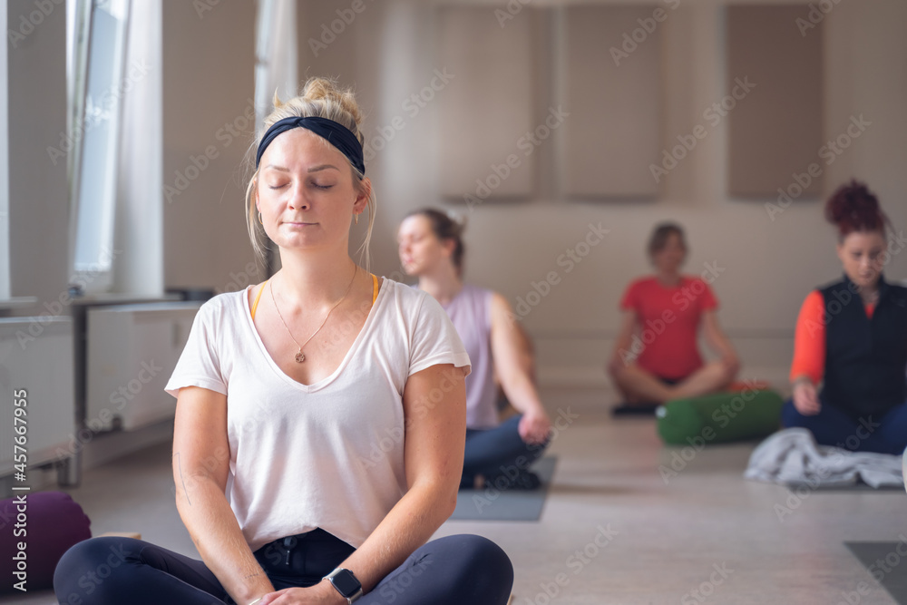 Obraz premium Group of young people have meditation on Yoga class.