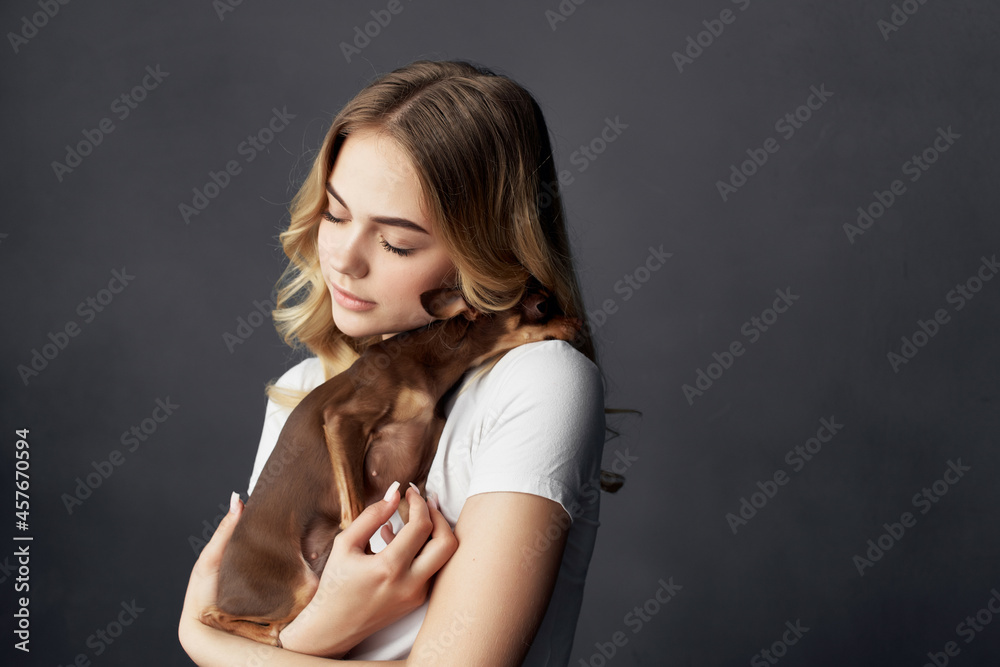 Fototapeta premium pretty woman pedigree dog fashion Lifestyle cropped view