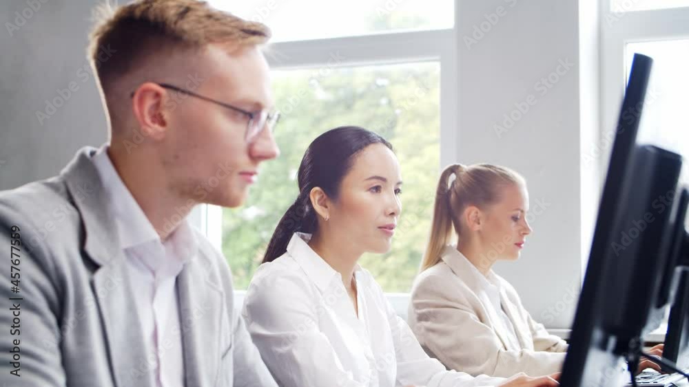 Diverse team of professionals is working in the e-mail support center. Working day of sales managers in office. Concept of business, consulting, and problem solving via email. Diverse team of professionals is working in the e-mail support center. Working day of sales managers in office. Concept of business, consulting, and problem solving via email.