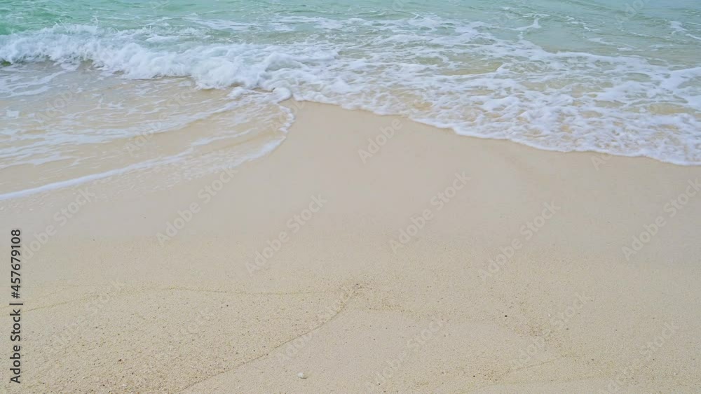 Soft wave with the blue ocean on a sandy beach. Holiday time vacation. Soft wave with the blue ocean on a sandy beach. Holiday time vacation.