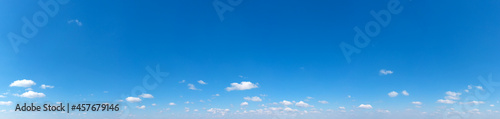 Blue Sky background with tiny Clouds. Panorama background