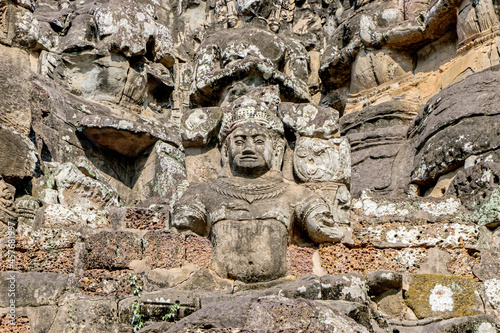 detail stone carving on wall of Khmer temple in Angkor Wat, Cambodia  © cceliaphoto
