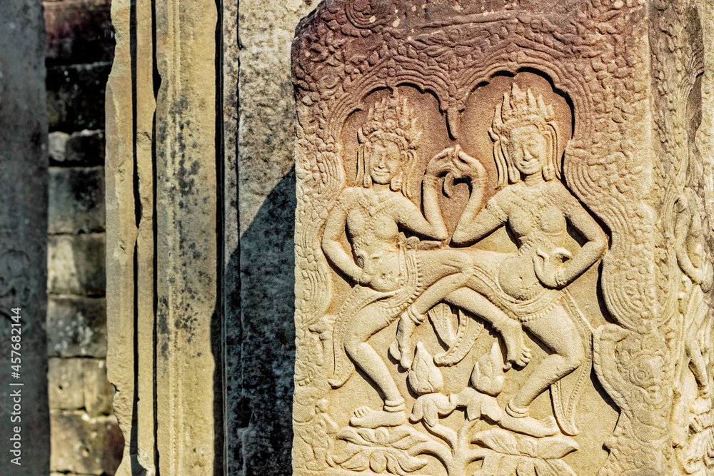 detail stone carving on wall of Khmer temple in Angkor Wat, Cambodia 