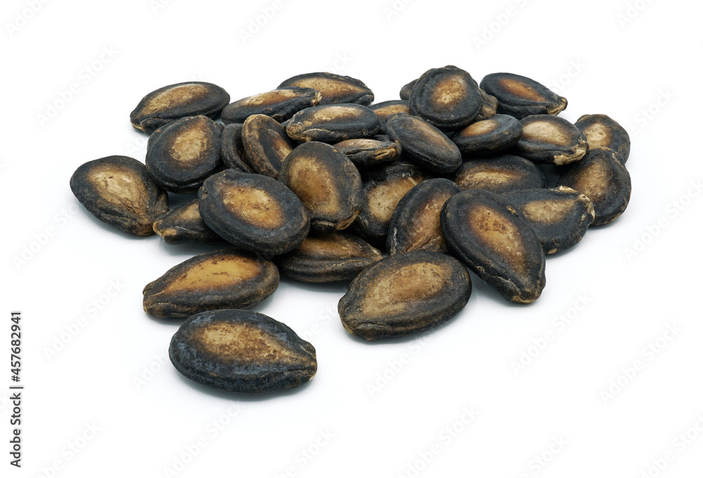 Dried watermelon seeds, Organic grains food, Isolated on white background Dried watermelon seeds, Organic grains food, Isolated on white background