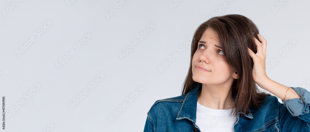 Thoughtful confused and dizzy european woman, Girl face expression feeling worry messy problems on isolated white background. Thoughtful confused and dizzy european woman, Girl face expression feeling worry messy problems on isolated white background.