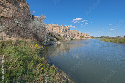 Rock face on the edge of the Milk River in Writing on Stone Provincial Park in Alberta, Canada photo