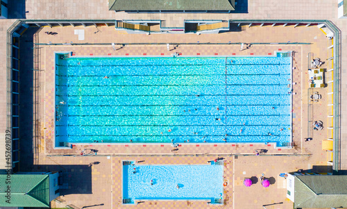 Canvas Print Aerial view of an outdoor Lido swimming pool in Summer sunshine