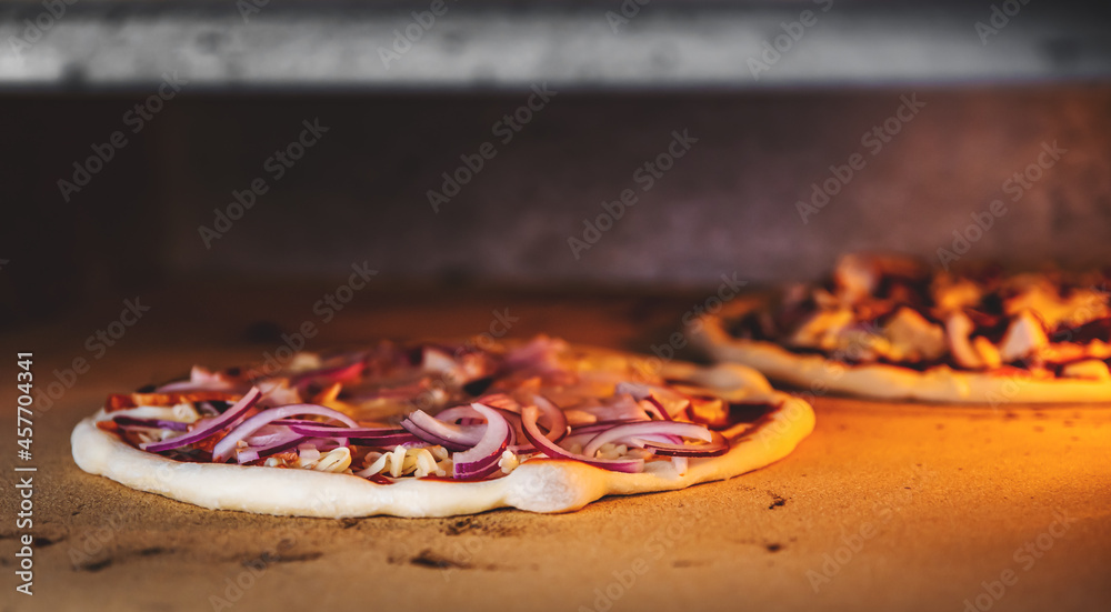 delicious pizza is baking in an oven