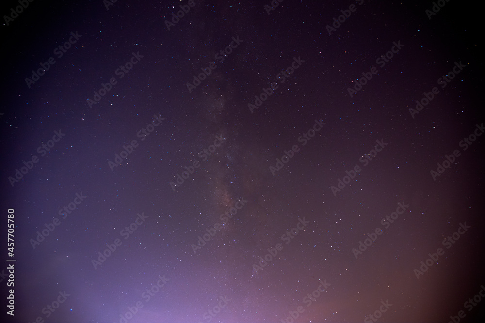 Abstract background of celestial stars, blurred wallpaper of the Milky Way at night, is a natural beauty. Seen during the time of the season