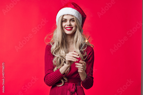 pretty woman in new year clothes holiday sparklers christmas