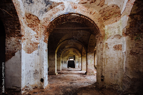 Large ancient vaulted hall of abandoned building