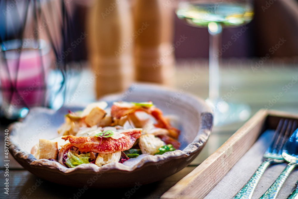 Caesar salad with crispy bread and bacon Caesar salad with crispy bread and bacon
