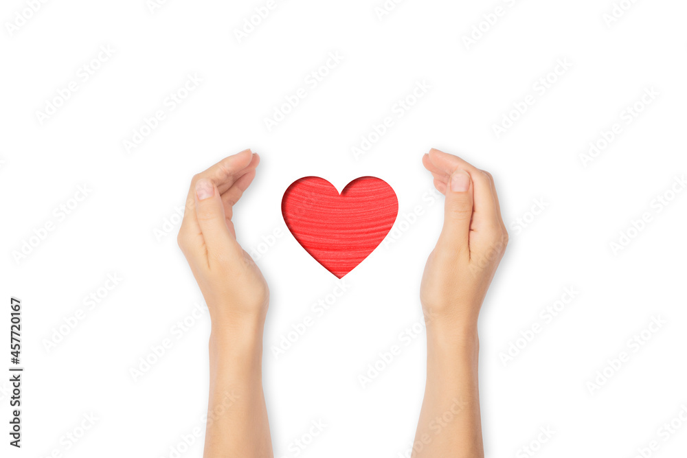 Open palms holding red heart isolated on white background. Love and care concept Open palms holding red heart isolated on white background. Love and care concept