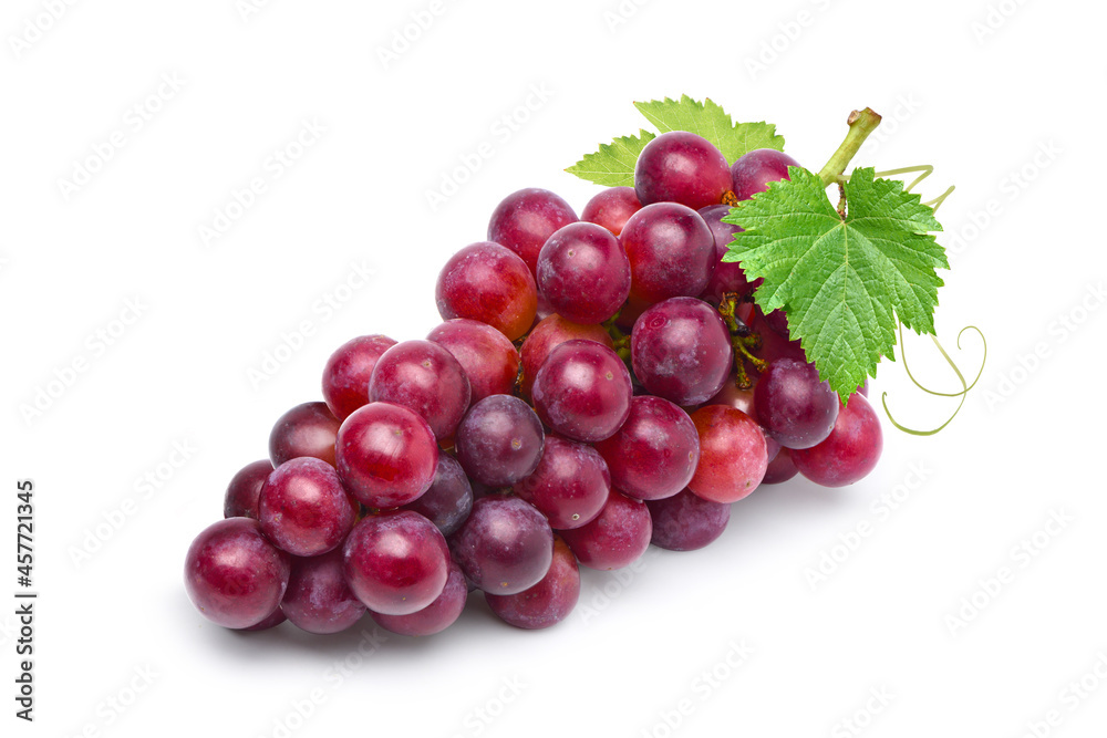 A bunch of red grape with leaves isolated on white background. A bunch of red grape with leaves isolated on white background.