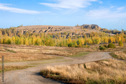 Konduki, Tula region, Romancevskie mountains, Abandoned Ushakov quarries. The mud erosion of the soil looks like mountains. The area is overgrown with young birches. Beautiful natural landscape