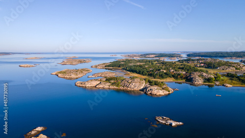 Swedish archipelago in Bohuslän with a blue sky in the background - Drone Perspective Landscape Photography photo