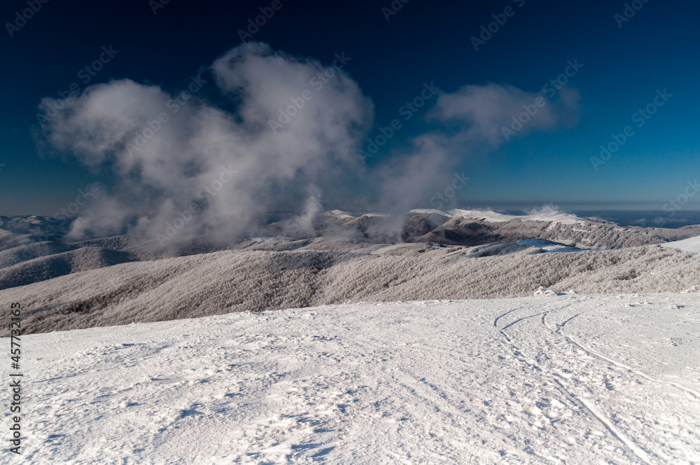 A view from the top of Wielka Rawka to the peaks of the Bieszczady Mountains, the Bieszczady Mountains A view from the top of Wielka Rawka to the peaks of the Bieszczady Mountains, the Bieszczady Mountains