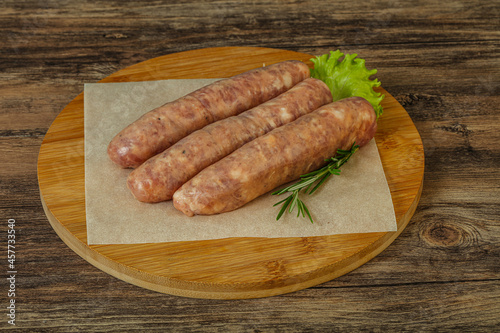 Raw pork meat sausages for grill