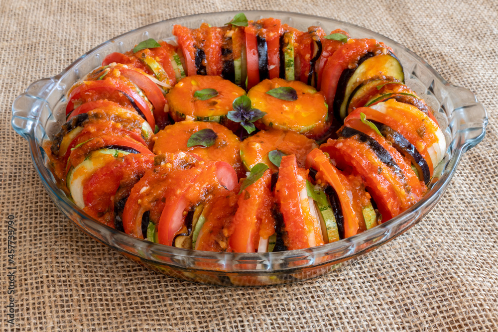ratatouille, with tomato slices, zucchini and onion ratatouille, with tomato slices, zucchini and onion