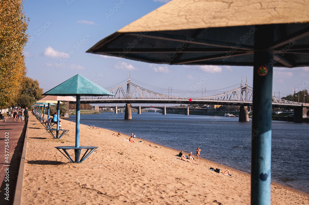 Summer beach in the city center with a view of the bridges Summer beach in the city center with a view of the bridges