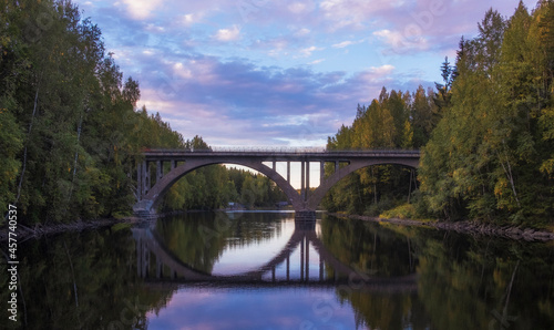 Old Finnish arch bridge on the Janisjoki river in Karelia