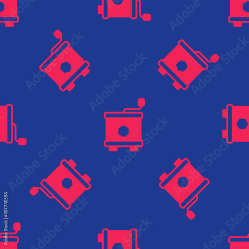 Red Honey extractor icon isolated seamless pattern on blue background. Mechanical device for honey extraction from honeycombs. Vector