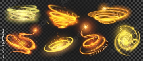 Shiny gold magic spirals and circles with sparkle dust. Glow glitter swirls. Shooting star with motion effect. Magic light trail vector set