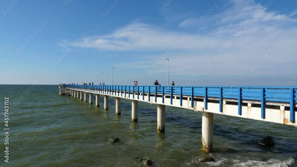 Baltic Sea coastline with pier and embankment for promenade in Zelenogradsk. Kaliningrad Region Baltic Sea coastline with pier and embankment for promenade in Zelenogradsk. Kaliningrad Region