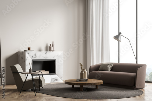 Living room interior with empty wall, armchair, sofa, fireplace © ImageFlow