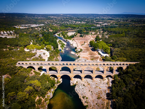 The aerial view of the Pont du Gard, an ancient tri-level Roman aqueduct bridge in France