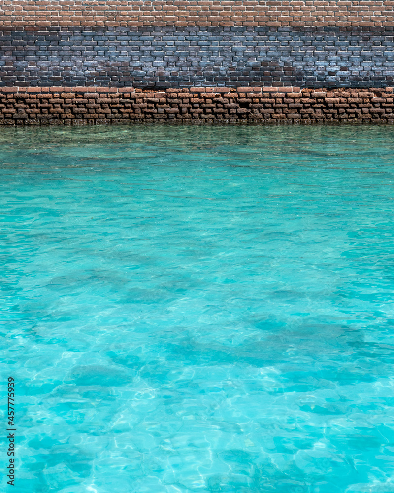 Blue Mote Waters and Aged Brick Wall