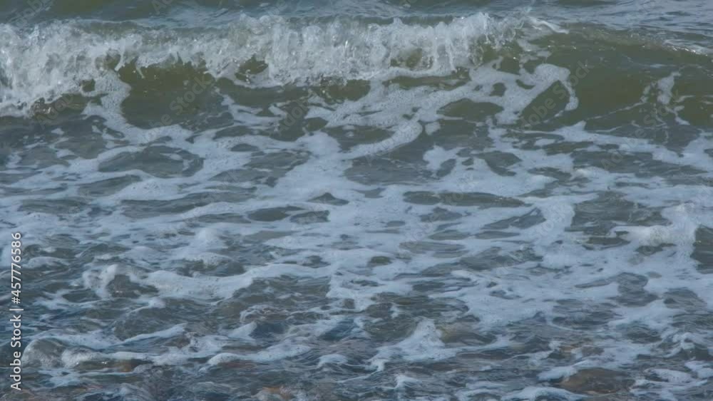 sea waves crash powerfully on the shore in storm in slow motion sea waves crash powerfully on the shore in storm in slow motion