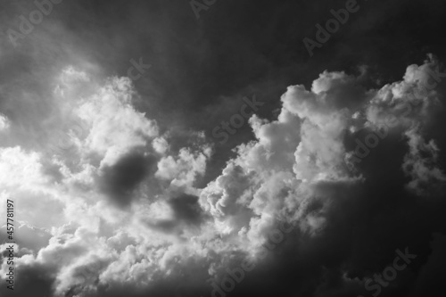 Close up of puffy clouds in dark sky