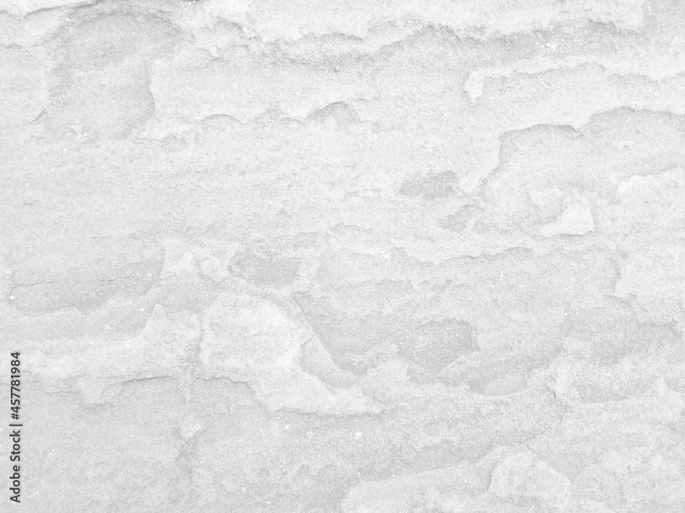 Obraz premium Rough white stone wall background in vintage style for graphic design or wallpaper