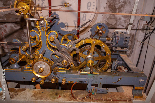 handcrafted antique bell tower clock mechanism from the 19th century that moves 4 clocks, one for each face