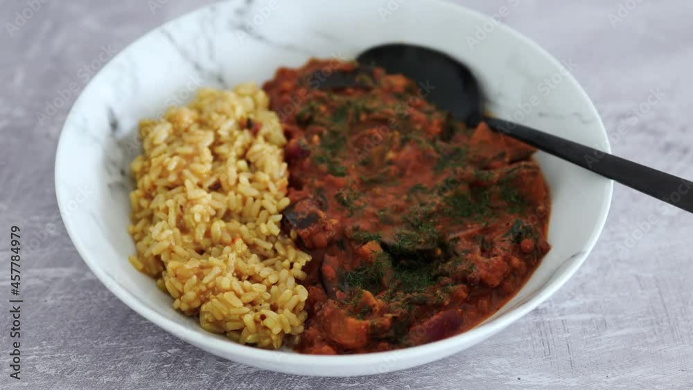 vegan eggplant lentil curry with brown rice, healthy plant-based food vegan eggplant lentil curry with brown rice, healthy plant-based food