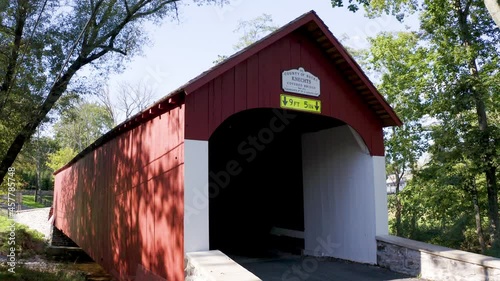 KNECHT'S COVERED BRIDGE IN BUCKS COUNTY, PENNSYLVANIA. BUILT IN 1873. NATIONAL REGISTER OF HISTORIC PLACES.  CROSSES COOKS CREEK. 110ft long 15ft wide.