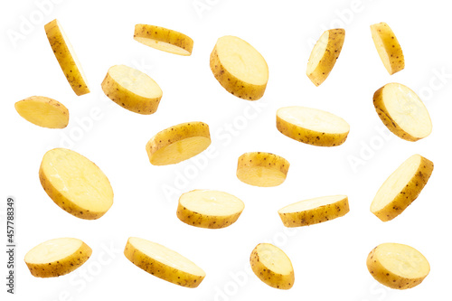 raw potatoes flying isolated on white