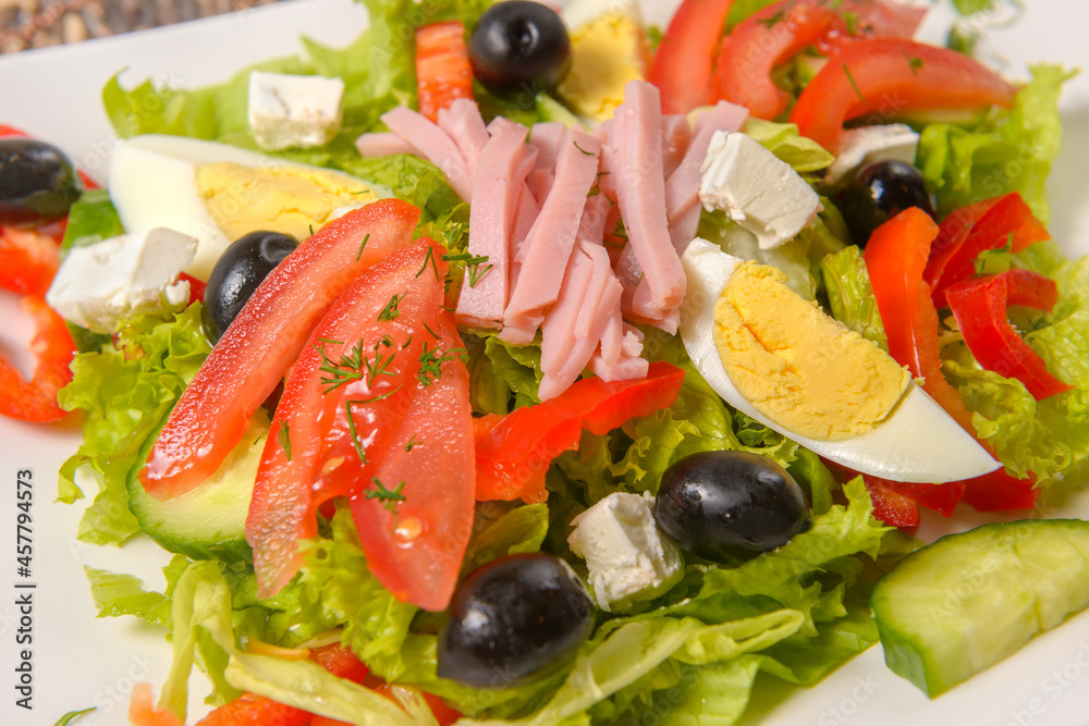 Fresh bulgarian salad with vegetables, tomatoes, onion, olives, boiled eggs, cheese and bacon. Salata bulgareasca traditionala Fresh bulgarian salad with vegetables, tomatoes, onion, olives, boiled eggs, cheese and bacon. Salata bulgareasca traditionala