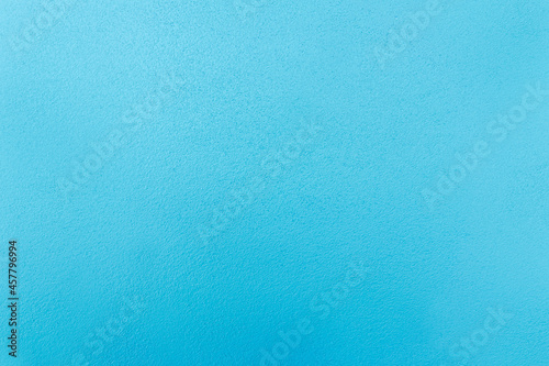 Blue pastel rough cement wall texture for background.