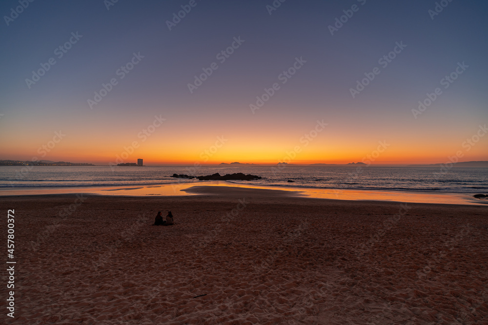 Beautiful sunset on the beach of Samil, in Vigo, Galicia. Beautiful sunset on the beach of Samil, in Vigo, Galicia.