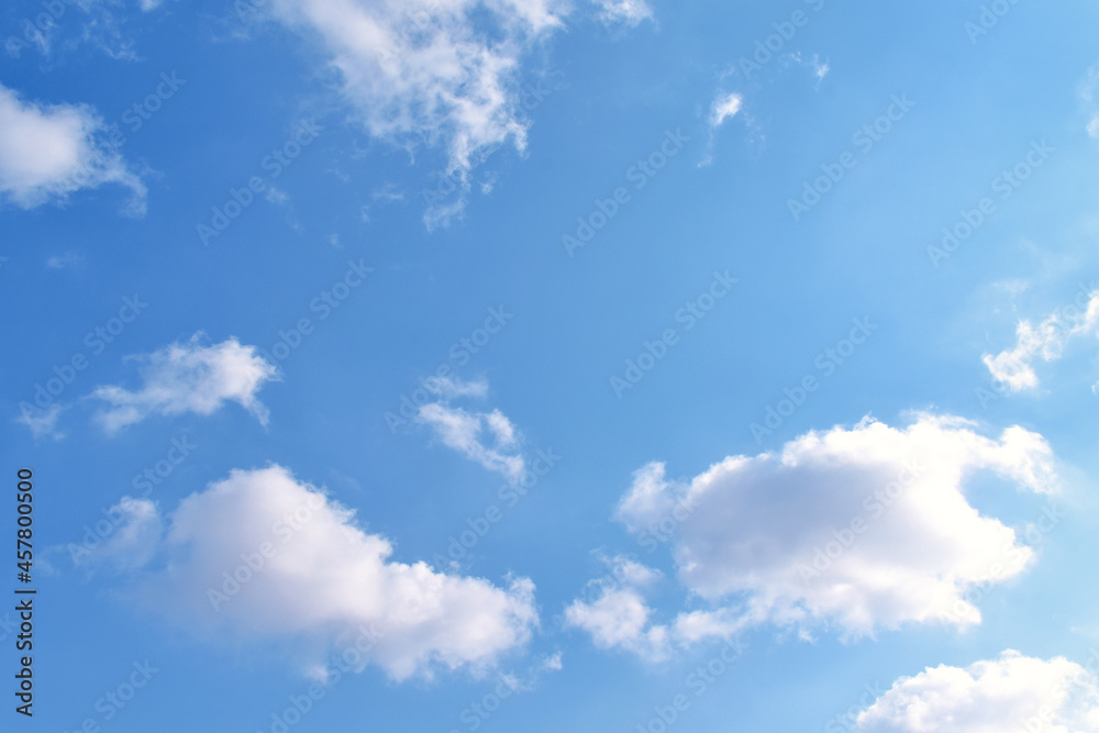 White clouds with blue sky in a sunny day. Pastel colour of sky in the morning. Concept of new life beginning, freedom of life and peaceful. White clouds with blue sky in a sunny day. Pastel colour of sky in the morning. Concept of new life beginning, freedom of life and peaceful.