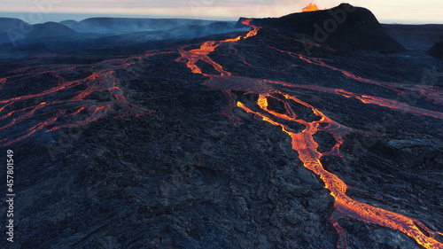 Lava flows from Mount Fagradalsfjall, aerial evening view, iceland
lava spill out of the crater  Mount Fagradalsfjall, September 2021, Iceland 
 photo