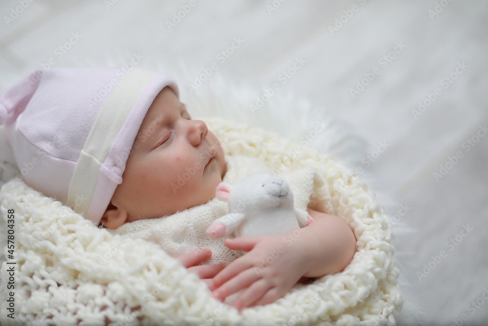 Baby newborn sleeping wrapped up in a blanket Baby newborn sleeping wrapped up in a blanket